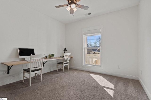 office with carpet and ceiling fan