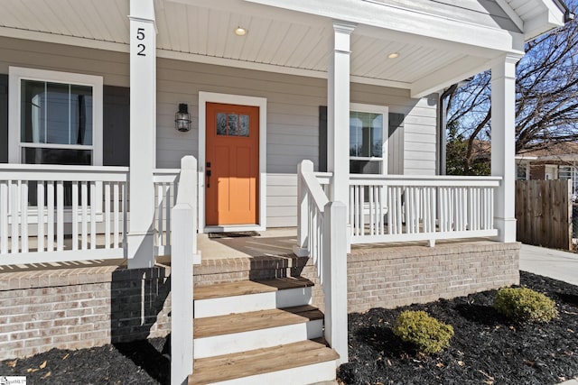 doorway to property with covered porch