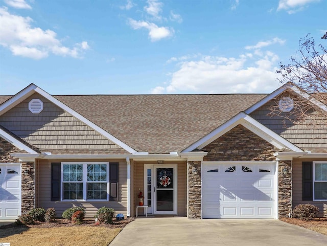 view of front of property with a garage