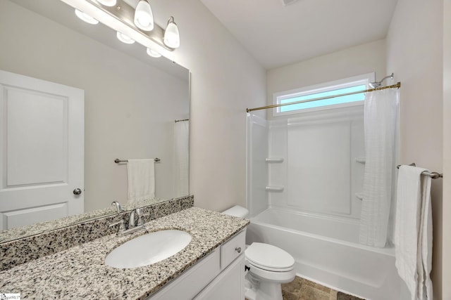 full bathroom featuring vanity, toilet, and shower / bathtub combination with curtain