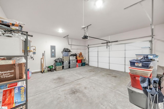 garage featuring electric panel and a garage door opener