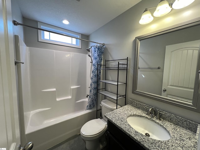 full bathroom featuring a textured ceiling, vanity, shower / tub combo, and toilet