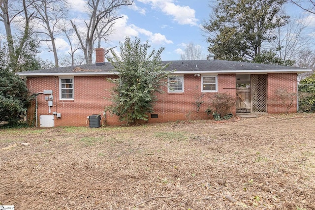 back of property featuring central AC unit