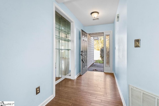 entryway featuring dark hardwood / wood-style floors