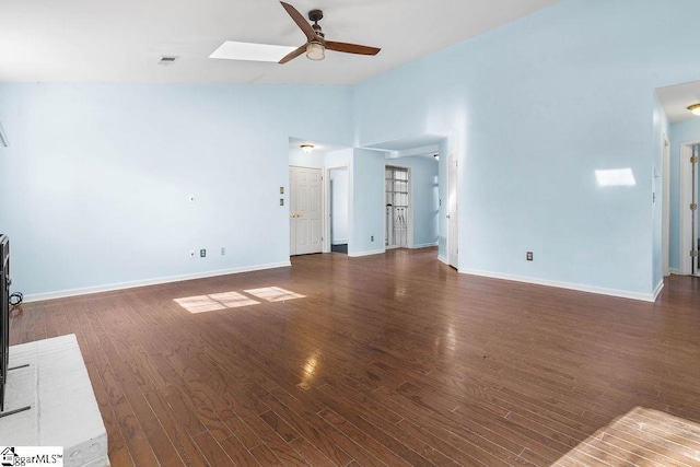 unfurnished living room featuring dark hardwood / wood-style floors, ceiling fan, and lofted ceiling