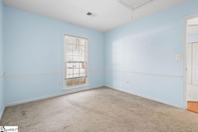 view of carpeted spare room