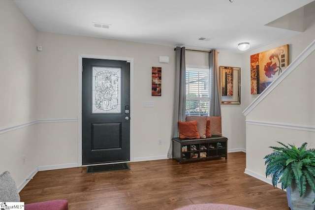 foyer featuring dark wood-type flooring