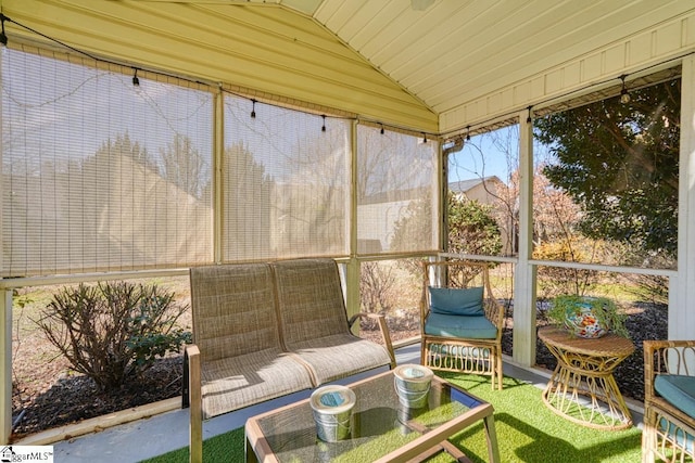 sunroom / solarium with vaulted ceiling