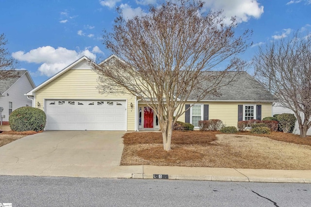 single story home featuring a garage