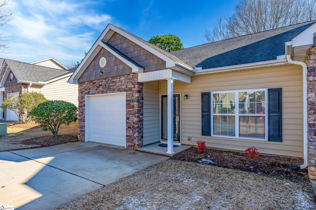 view of front of property featuring a garage