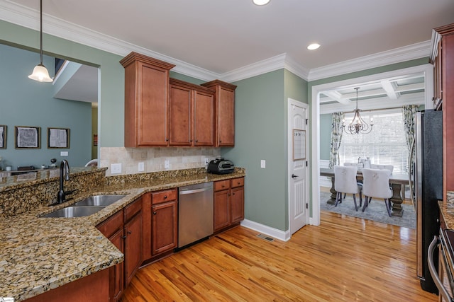 kitchen with coffered ceiling, sink, ornamental molding, beamed ceiling, and stainless steel appliances