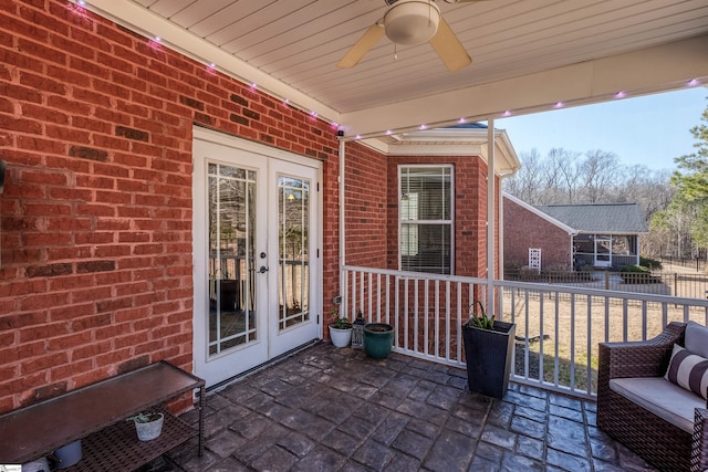 view of patio / terrace with ceiling fan and french doors