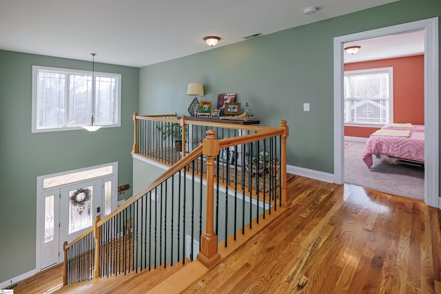 stairway with wood-type flooring