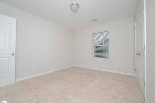 view of carpeted spare room