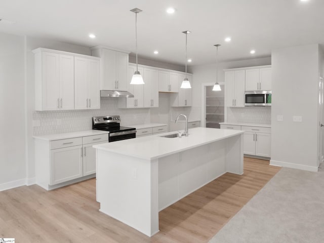 kitchen featuring white cabinets, sink, and stainless steel appliances