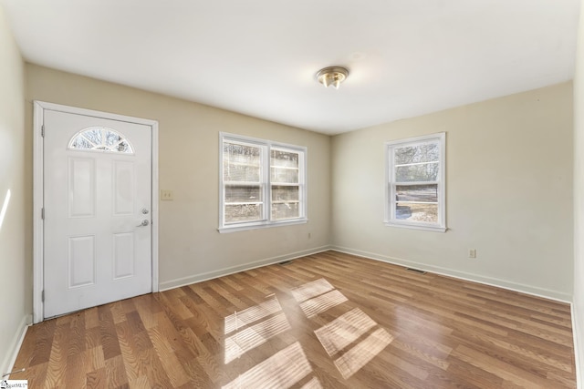 foyer entrance featuring light hardwood / wood-style floors