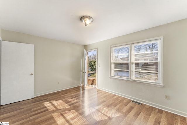 empty room featuring light hardwood / wood-style floors