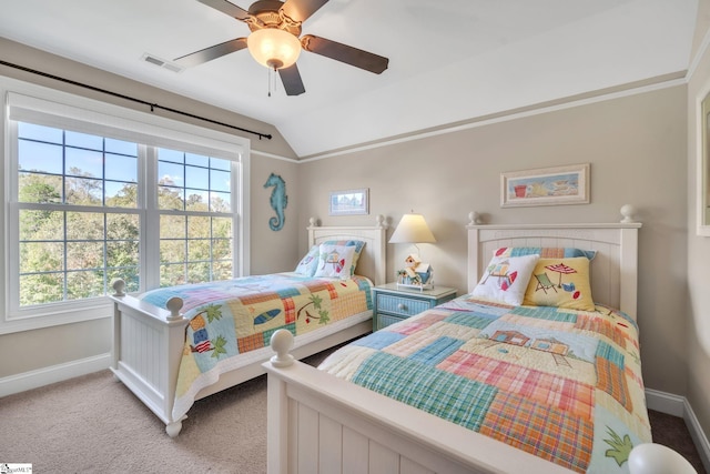 bedroom with ceiling fan, light colored carpet, and vaulted ceiling