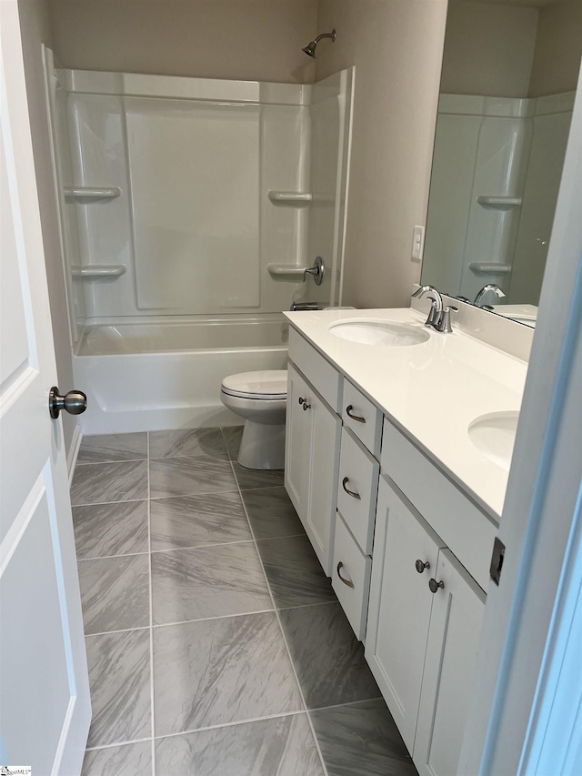 full bathroom with washtub / shower combination, vanity, and toilet