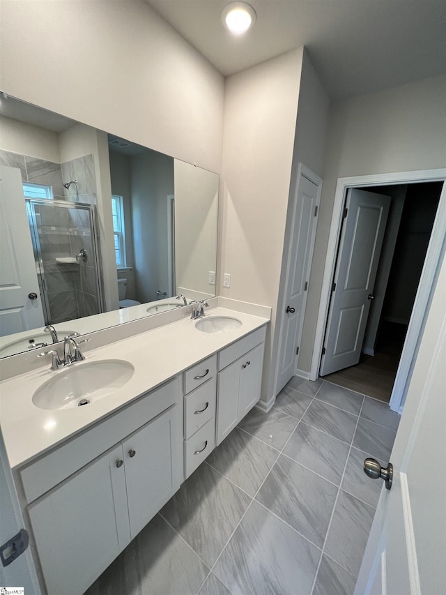 bathroom featuring vanity and walk in shower