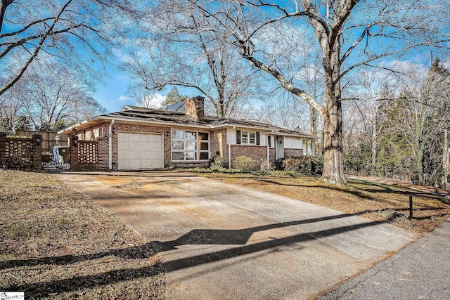 ranch-style home with a garage