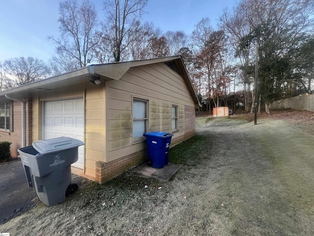 view of home's exterior with a garage