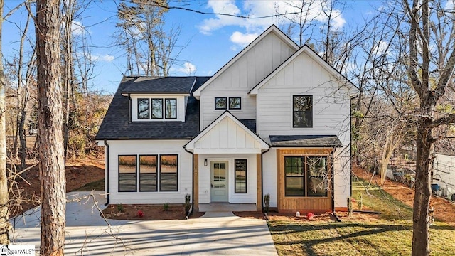 modern farmhouse with a front yard