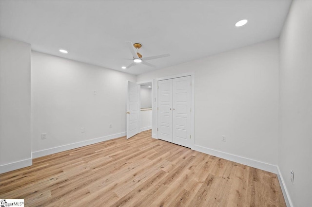 unfurnished bedroom with a closet, ceiling fan, and light hardwood / wood-style floors