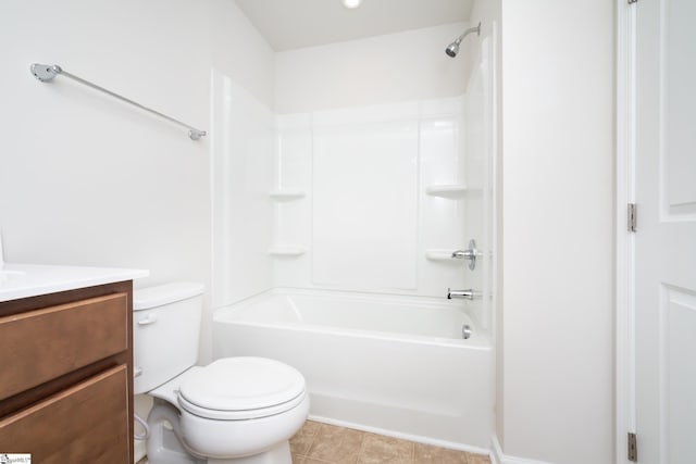 full bathroom featuring toilet, vanity, tile patterned flooring, and shower / bath combination