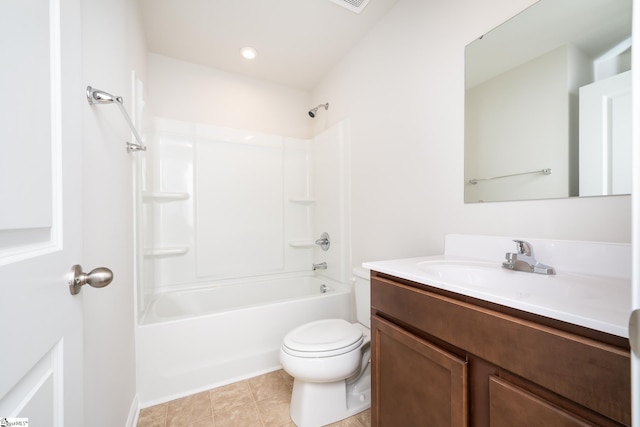 full bathroom featuring toilet, vanity, tile patterned flooring, and bathing tub / shower combination