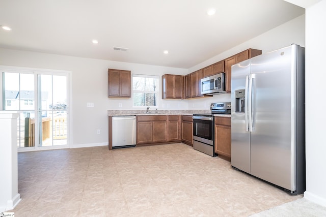 kitchen featuring sink and appliances with stainless steel finishes