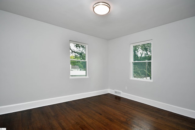 empty room featuring hardwood / wood-style floors