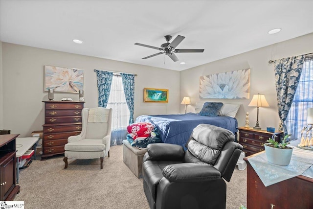 carpeted bedroom with ceiling fan