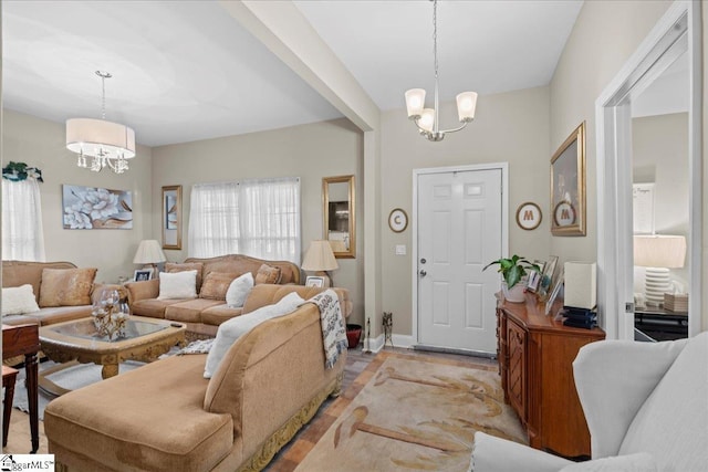 foyer with an inviting chandelier