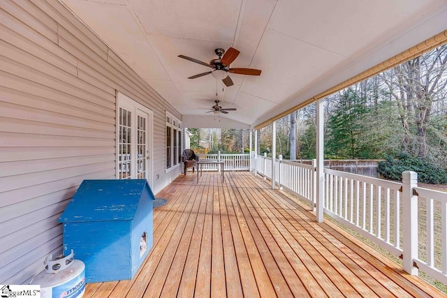 wooden terrace featuring ceiling fan