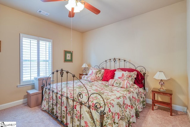 bedroom with ceiling fan and carpet