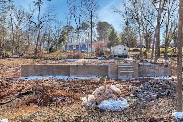 view of yard with a storage shed