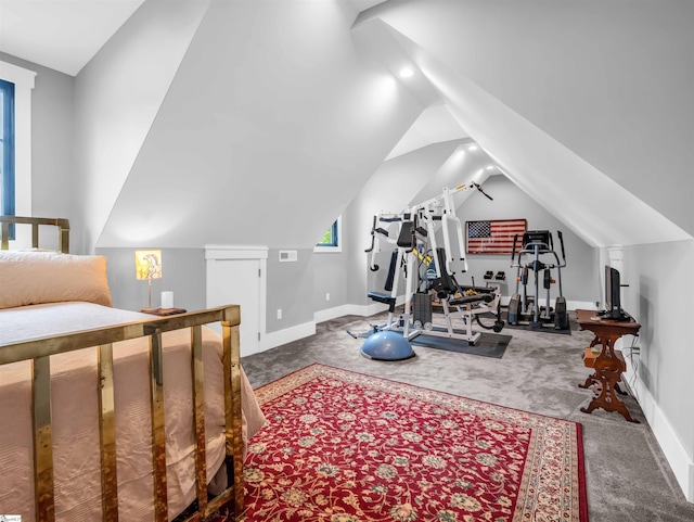 workout room featuring lofted ceiling and carpet flooring