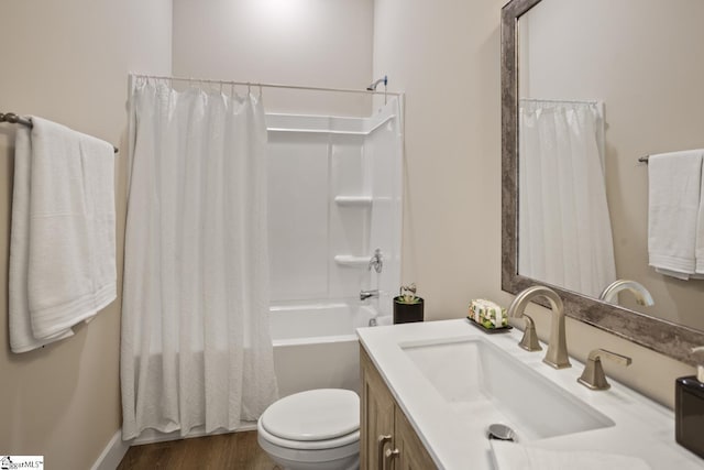 full bathroom featuring shower / bathtub combination with curtain, toilet, vanity, and wood-type flooring