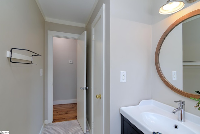 bathroom featuring tile patterned flooring and vanity