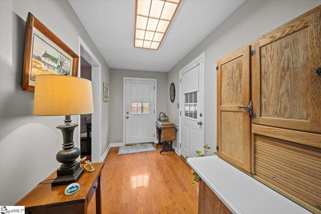 entryway with light wood-type flooring