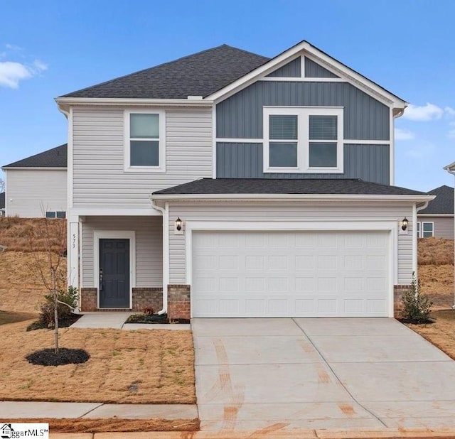 view of front of property featuring a garage