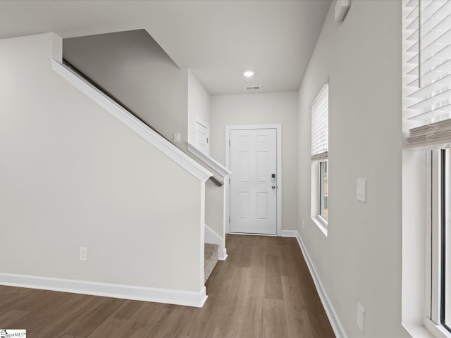 entrance foyer with hardwood / wood-style floors