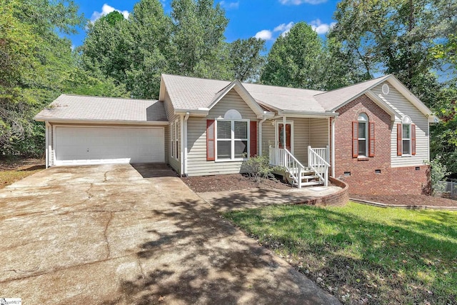 view of front facade with a front yard and a garage