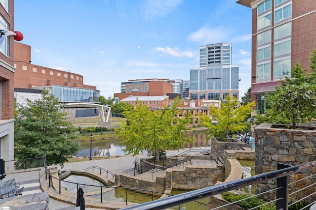 view of home's community with a water view