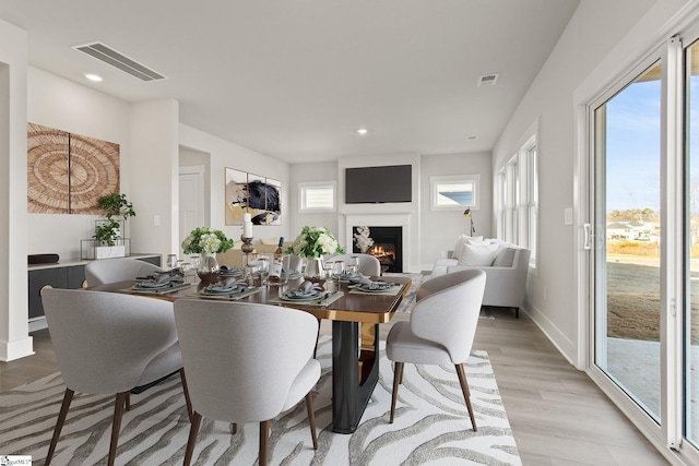 dining room with light wood-type flooring