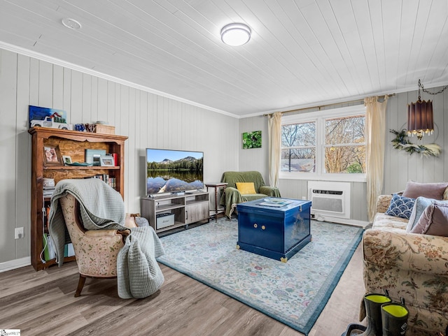 living room with wood ceiling, ornamental molding, and wood-type flooring