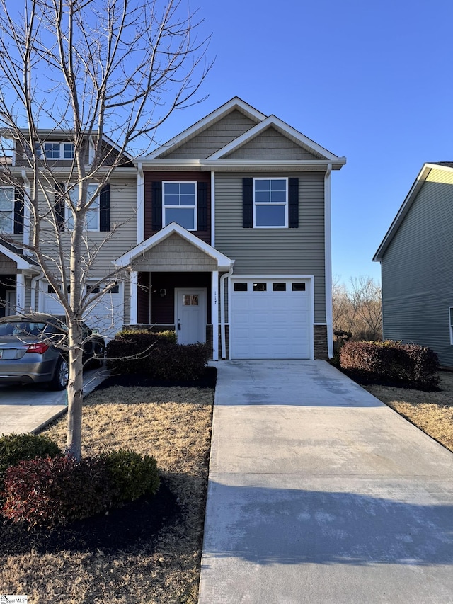 view of front of property featuring a garage