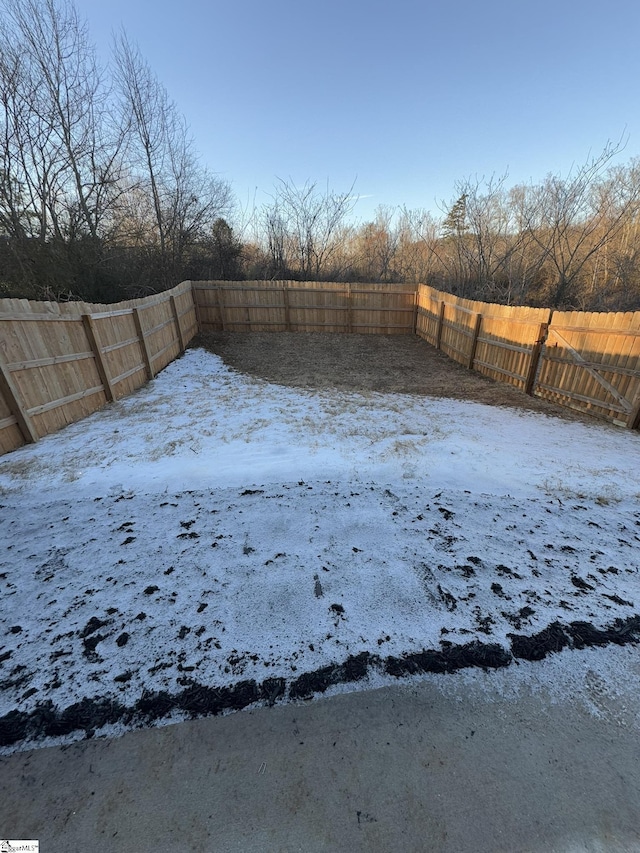 view of yard covered in snow