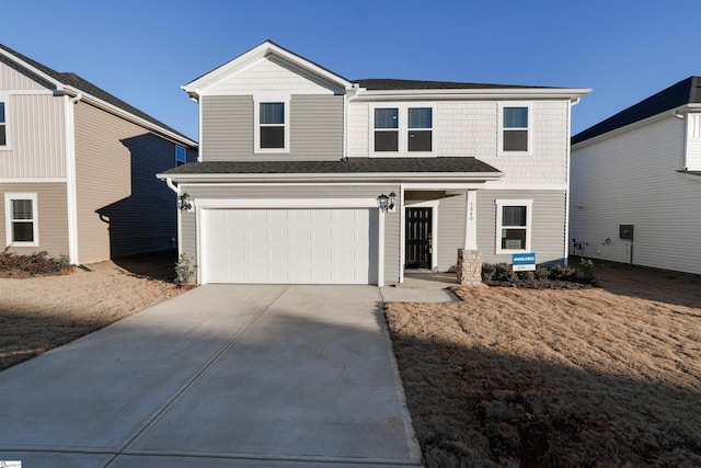 view of front property with a garage